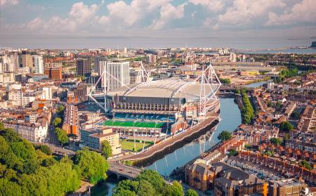 a picture of cardiff's river and the principality stadium