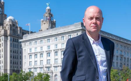 Cllr Robinson outside the Cunard Building in Liverpool 