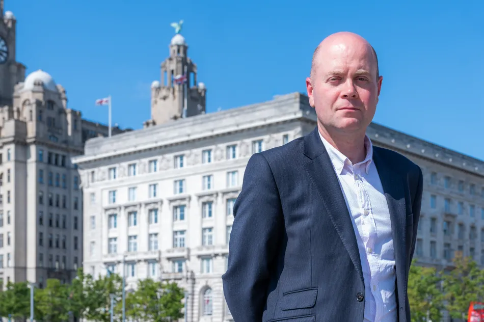 Cllr Robinson outside the Cunard Building in Liverpool 