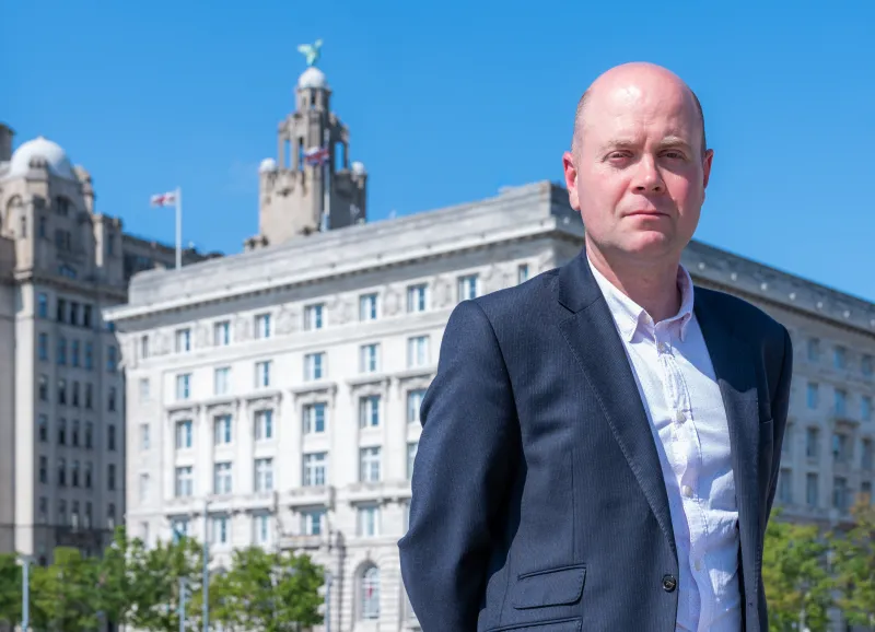Cllr Robinson outside the Cunard Building in Liverpool 